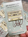 Cream-and-white cassette tape enamel pin reading Mixed feelings vol. 1 on a Yours Truly, Mary Anne backing card.