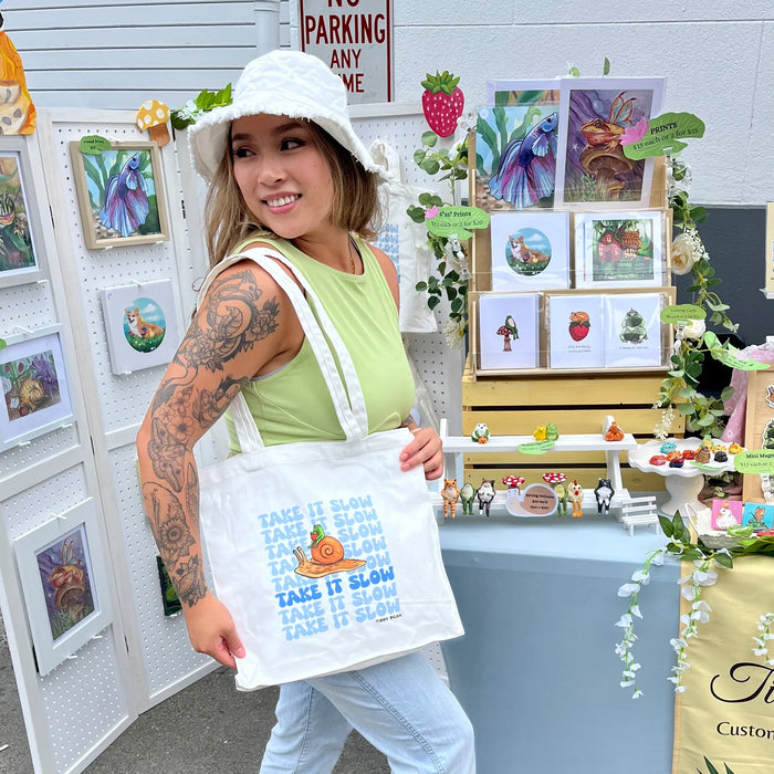 “Take it slow” snail and frog tote bag