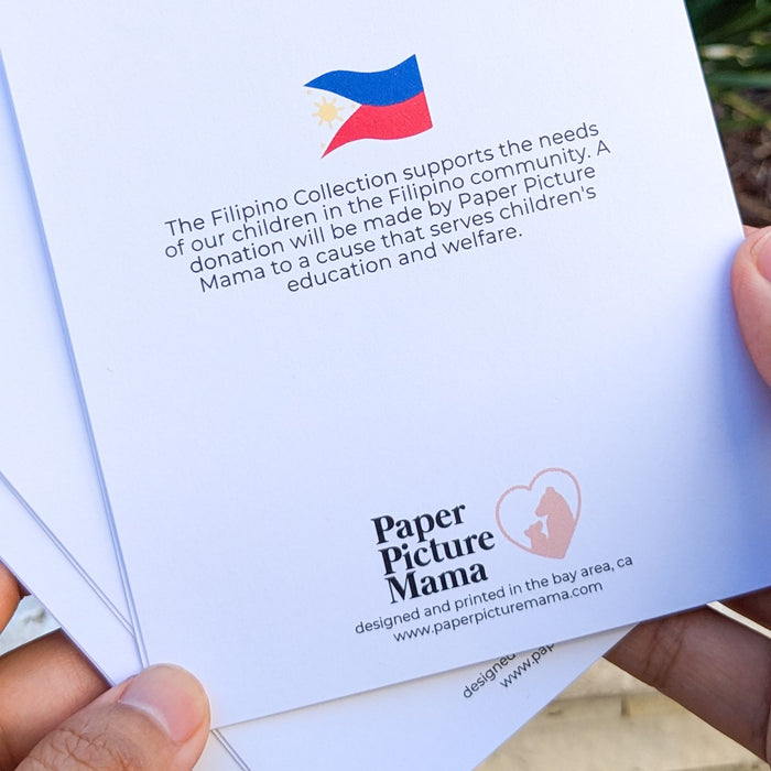 Back of a Paper Picture Mama Filipino Collection card describing its community giving program.