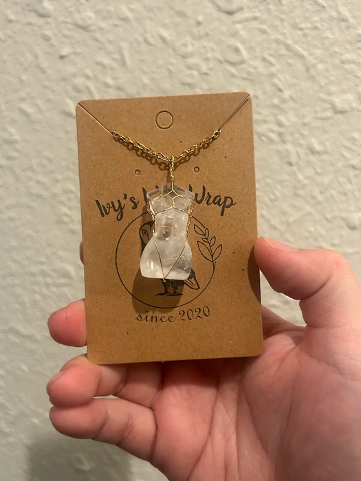 Clear quartz figurine pendant