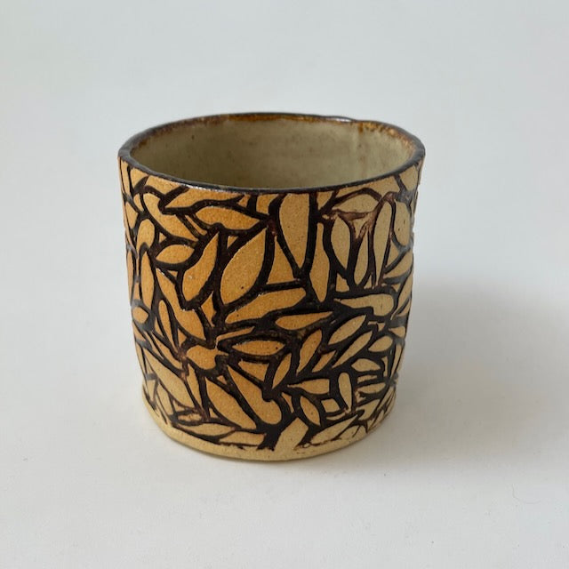 Small cover pot with abstract texture