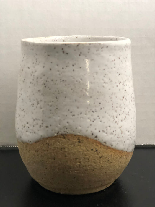 White and beige cup